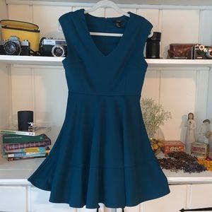Skater dress with shoulder pads